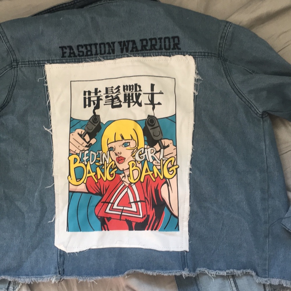 light wash jean jacket with patch